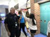 SRO Blume greets students as they change classes.