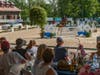 Spectators enjoy show jumping from the hospitality tent at Monmouth at the Team.