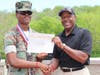YM/Sgt Jaelen Bobo receiving his first place prize from SgtMaj Alford McMichael, 14th Sergeant Major of the Marine Corps