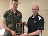 YM/1stSgt John Sollinger receiving the Kiki Camarena Award from Special Agent Eric Woodard