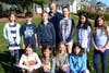 Environmental sustainability slogan contest winners gathered with Director of Facilities Ed Kirk