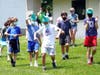 New Canaan Country School Grade 6 social studies students worked in teams identified by different colored bandanas to participate in the annual "Trade Routes" game.