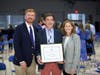 Head of School Aaron Cooper and Sarah O'Herron Casey '80 presented the O'Herron Family Faculty Award to NCCS 30-year educator Mark Macrides during the school's 2021 Annual Meeting.
