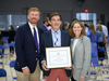Head of School Aaron Cooper and Sarah O'Herron Casey '80 presented the O'Herron Family Faculty Award to NCCS 30-year educator Mark Macrides during the school's 2021 Annual Meeting.