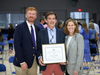 Head of School Aaron Cooper and Sarah O'Herron Casey '80 presented the O'Herron Family Faculty Award to NCCS 30-year educator Mark Macrides during the school's 2021 Annual Meeting.