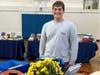 Michael Bria collected and distributed 6,000 books at free book fair Sept. 24 as part of an Eagle Scout Project.