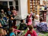 Teacher Maria Sette read seasonal favorites to members of the Lower School and Horizons community during PJs & Pizza, Nov. 9.