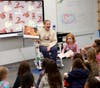 Teacher Melissa Gomes read seasonal favorites to members of the Lower School and Horizons community during PJs & Pizza, Nov. 9.