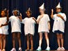 Horizons first grade students shine in their performance of “If I only had a heart” during the Musical Revue.
