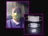 Seamstress Mikki Carping made a mother-daughter-doll set of masks to ease a child's fears. 