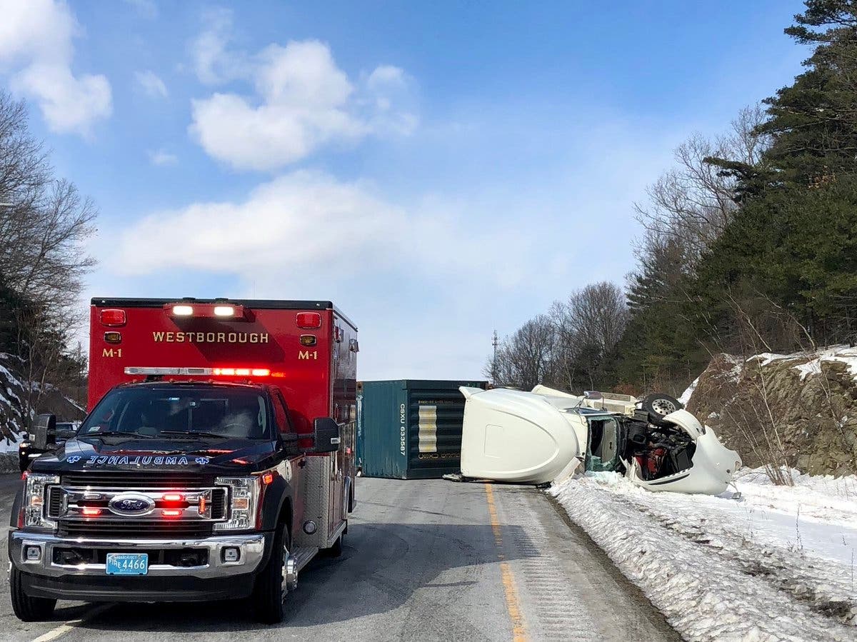 A tractor-trailer rolled over, blocked three lanes on I-495 South at Exit 23 on Thursday.