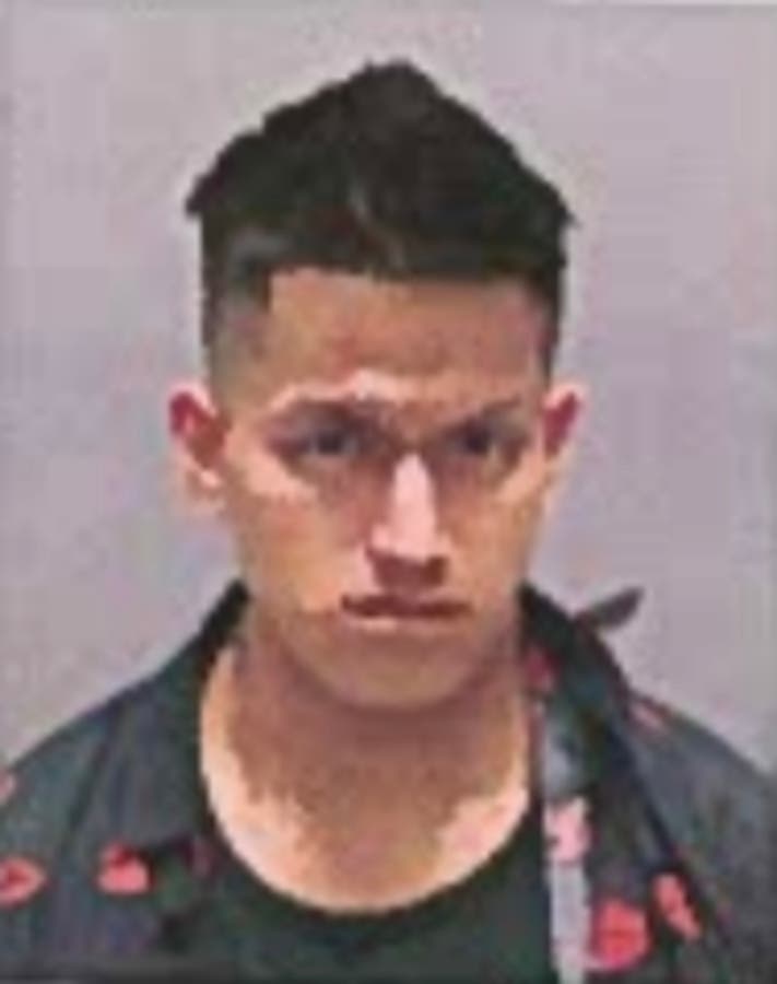 The young man crashed into a utility pole, cutting it in half, according to police.