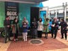 Mayor Yvonne Spicer cuts the ceremonial ribbon allowing the bookmobile to hit the streets.