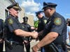 O'Loughlin took the time to shake hands with each Milford officer.