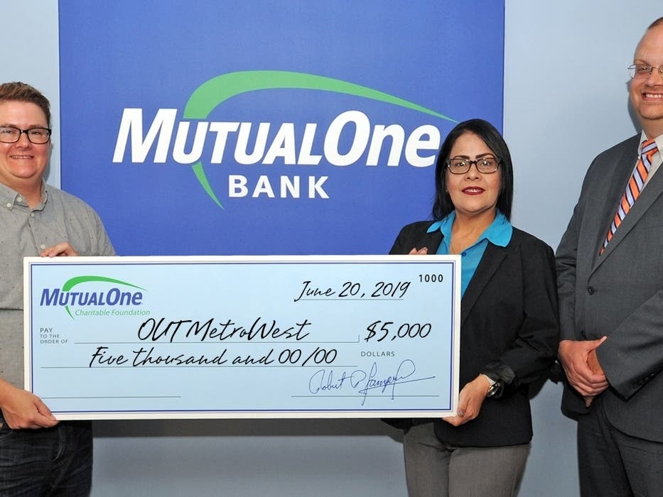 Celebrating MutualOne Bank’s $5,000 Charitable Foundation grant to OUT MetroWest