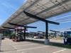 The panels will be placed on canopies over the parking lot.