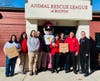 Pictured (left to right): Jennifer Salman-volunteer, Dani Stanevicz-Animal Care Specialist-Behavior and Enrichment, Lisa Lagos-Animal Care Manager, Hope Spargo-Animal Care Specialist, Papa, Anna Chaletzky (and Phoebe)-Animal Field Agent, Linda Palmer.