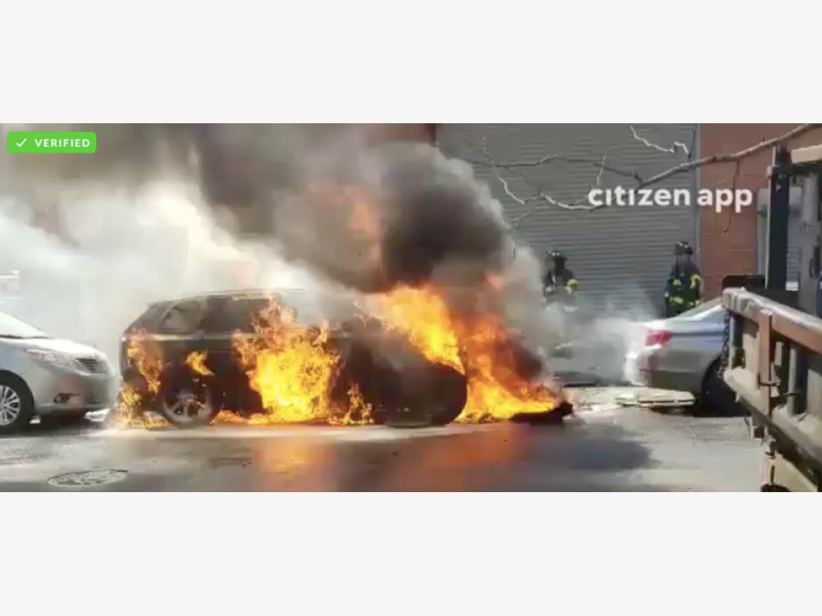 A car broke into flames near Throop Avenue.