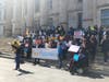 Foster youth and a coalition of activists rally for funding at Brooklyn Borough Hall.