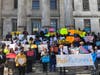 Foster youth and a coalition of activists rally for funding at Brooklyn Borough Hall.