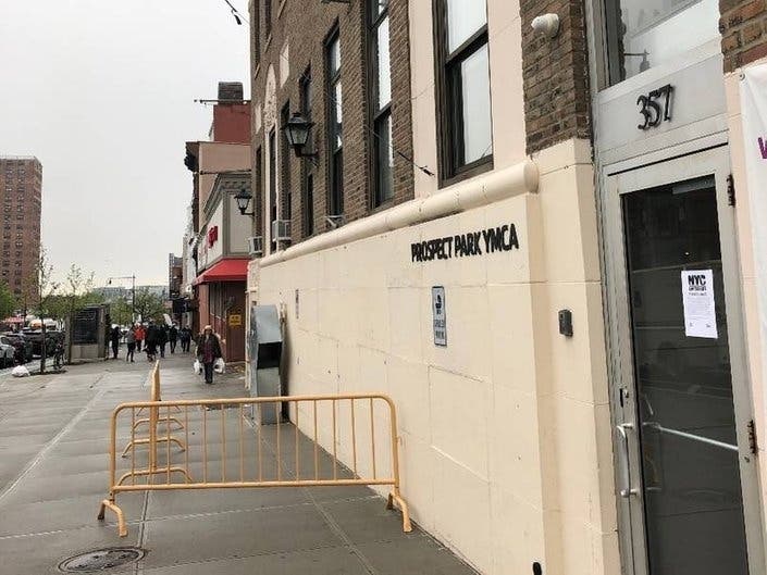 Flyers mocking Mayor Bill de Blasio's run for president posted at the Prospect Park YMCA.