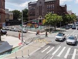 A completed portion of the Fourth Avenue bike lane, which will be finished from 15th to 64th streets this year.