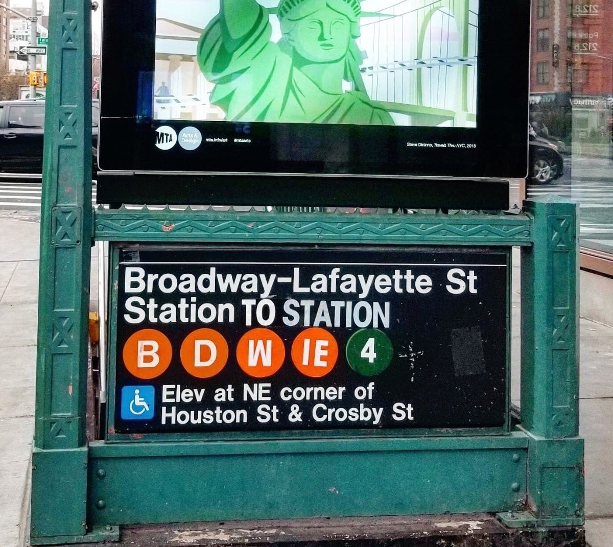 A tribute to the music icon appeared at the Broadway-Lafayette station on the anniversary of Bowie's death Friday.