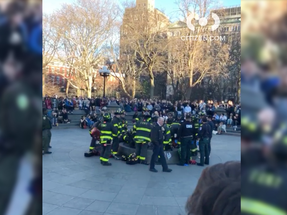 Firefighters used soap and water to rescue a kid who got stuck in the fountain as a crowd of onlookers watched from the steps, video shows.