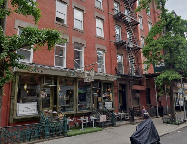 More than 100 firefighters were working to put out a blaze that erupted in multiple floors of the East 7th Street building, officials said.