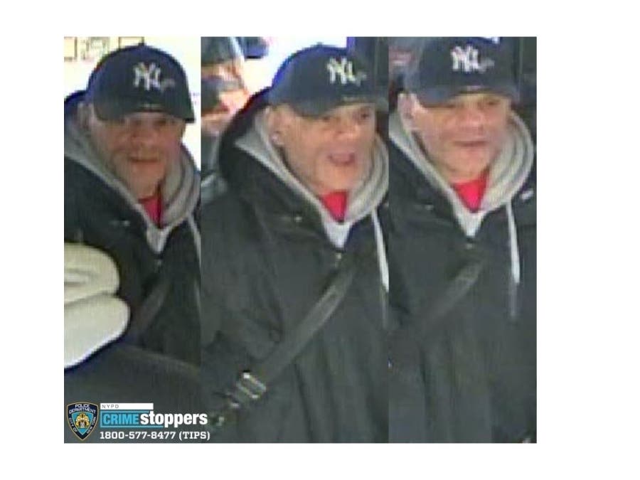 Cops are looking for a man who bear-hugged a woman from behind and then punched her in the face as he tried to rob her.