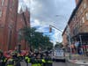 The building holding Body Elite gym on Court Street collapsed just before 5 p.m., according to officials and photos from the scene.