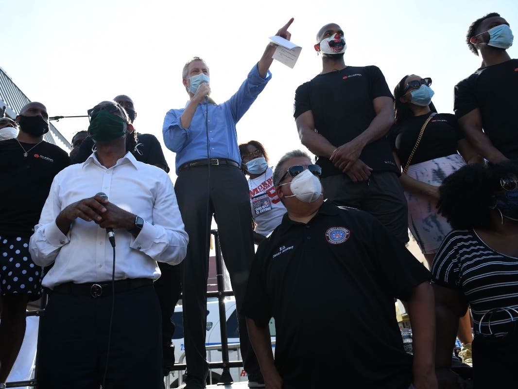 Hundreds decried a spike in shootings Saturday with a "Cease-Fire" march in Brooklyn, even as more gun violence broke out blocks away.