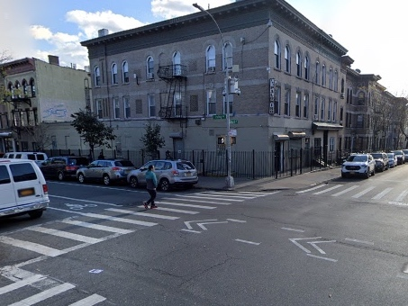 A 77-year-old woman was hit at the intersection of Dekalb and Irving avenues on Friday, police said.