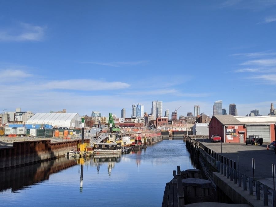 A small hole was found on the barge filled with 850 tons of sediment from the Gowanus Canal that sunk earlier this week, officials said.