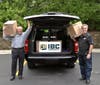 Springing into action, Southfield Corporation President Joe Benson and IBC President Jerry Vinci load trucks to a prompt delivery of masks to the King-Bruwaert House senior community.