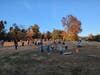 Overview of the crowd enjoying the food, music and pumpkin smashing. 