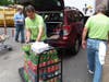 North Fulton Charities volunteers help unload donations