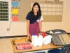 Teacher Audra Coleman provides breakfast for the young scholars