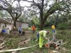 Helping Hands volunteers, Helping to clear debris from Hurricane destruction