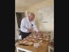 "Feed them and they will come."-  Senior missionary Keith Roos feeds hungry students.