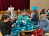 Women's Day of Service 2023, Volunteers Making Blankets