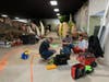 Just a few months ago, what is now Jurassic Gardens was a teeming mass of dino pieces awaiting placement in a newly gutted building on the Volo Auto Museum grounds.