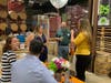 Visit McHenry County Sales and Marketing Manager Kristine Austin, center, clockwise, enjoys with other attendees a 16th anniversary celebration for the destination marketing organization at Scorched Earth Brewing Co., Algonquin.