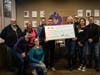 Celebrating Atturo's Diamond-level contribution are (standing, from left) Bob Riegel, Ann Rivera, Michael Mathis, Joe Gomez, Ann Marie Mathis, Troy Altman, Kate Kobb and Karl Becker. In front (from left) are Debbie Cisneros and Ashley Lawless. 