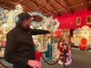 Volo Museum Marketing Director Jim Wojdyla points out where Santa will hear children's Christmas wishes in the Carousel Room at Volo Museum during the first three weekends in December. Kids can also ride the carousel with Santa.