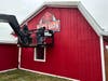 Workers install the new sign at Volo Museum's new Party Barn, a space for private gatherings that is set to open in March. Learn more about available party packages at volofun.com.