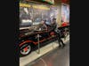 A cosplayer dressed as Catwoman poses near the Volo Museum's Batmobile during a previous Princess and Superhero Day at the museum, located at 27582 Volo Village Road. This year's event is March 25.