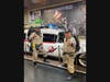 Costumers With a Cause strike a pose in front of the Volo Museum's Ecto-1 during a previous Princess and Superhero Day at the museum. This year's Princess and Superhero Day is March 25.
