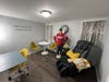 Dawn Bremer, president and owner of the Bremer Team - Keller Williams Success Realty, shows off the office of the team's new concierge suite — where home sellers can work or relax with kids and pets during showings or home inspections.