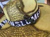Shown is a detail shot of one of the intricately crafted fedoras Lauren Sharp of Johnsburg creates. A gallery of designs can be viewed at artforadrienne.com, where orders may be placed. Custom orders also are available.